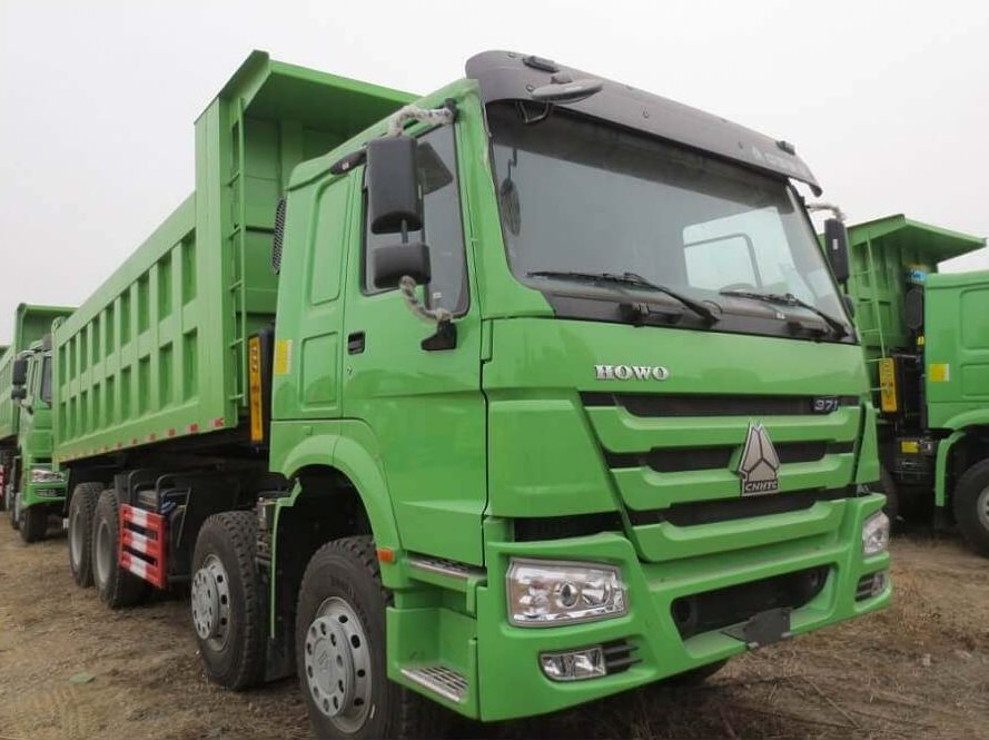 green dumpster truck